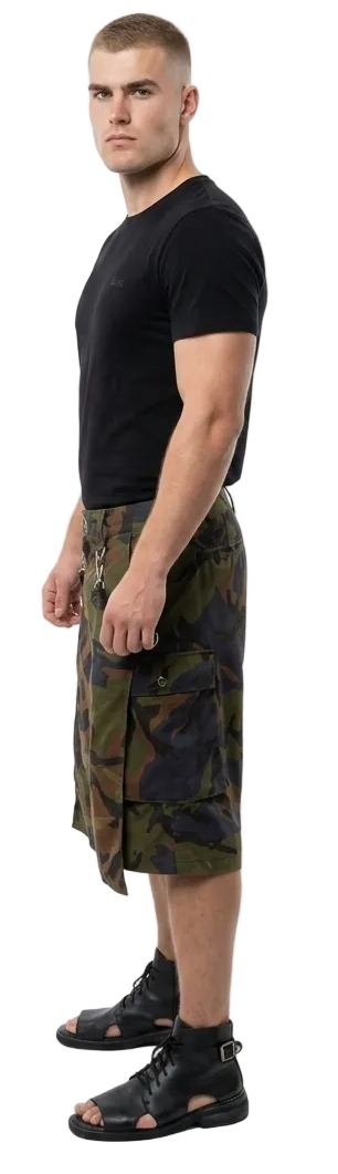 Man wearing a black t-shirt and camouflage skirt on a white background